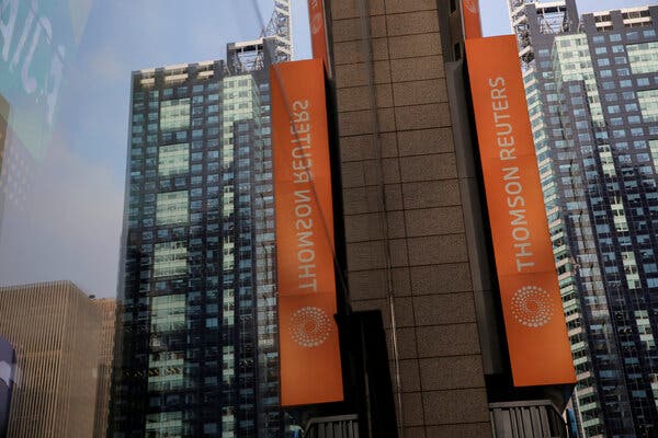 The Thomson Reuters offices in Times Square. The company’s media organization will begin charging for access to its website.